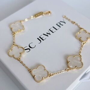 SC Jewelry Gold Bracelet with White Clover Motifs